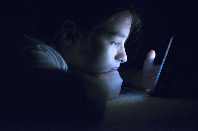When teens can’t sleep, they often scroll online well into the night, which only exacerbates the problem. ljubaphoto/E+ via Getty Images